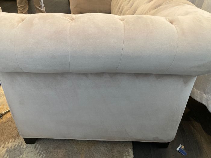 close up of the side of a microfiber couch after red marker drawings were professional upholstery cleaned by Zerorez